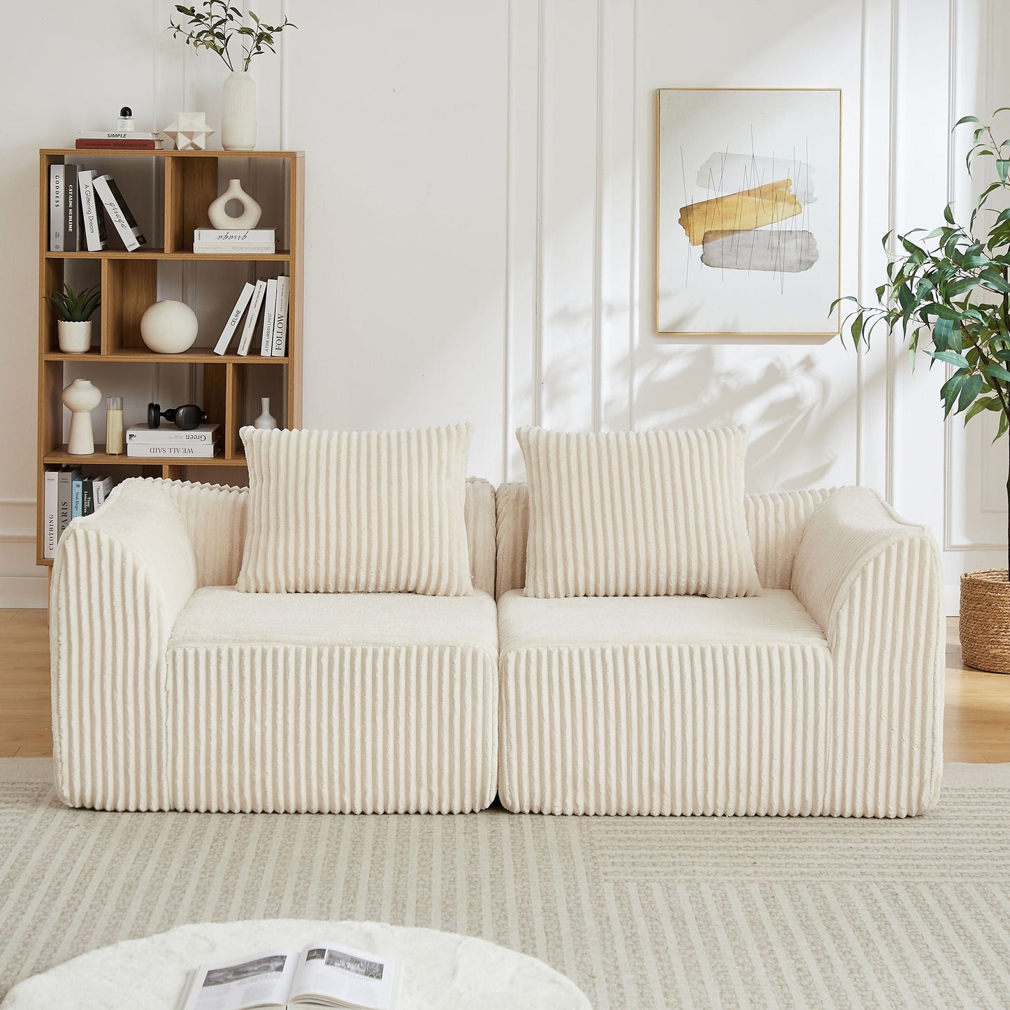 Minimalist Sofa With Curved Lines And Horn Shaped Throw Pillows Home Essentials