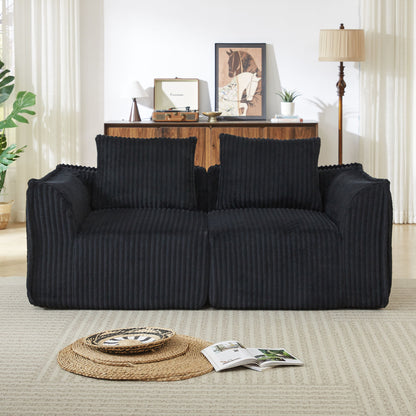 Minimalist Sofa With Curved Lines And Horn Shaped Throw Pillows Home Essentials