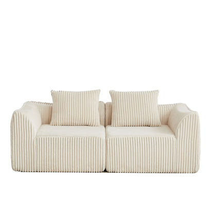 Minimalist Sofa With Curved Lines And Horn Shaped Throw Pillows Home Essentials