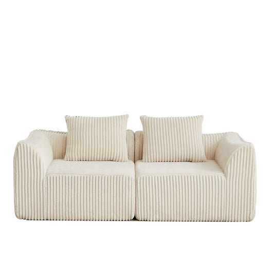 Minimalist Sofa With Curved Lines And Horn Shaped Throw Pillows Home Essentials