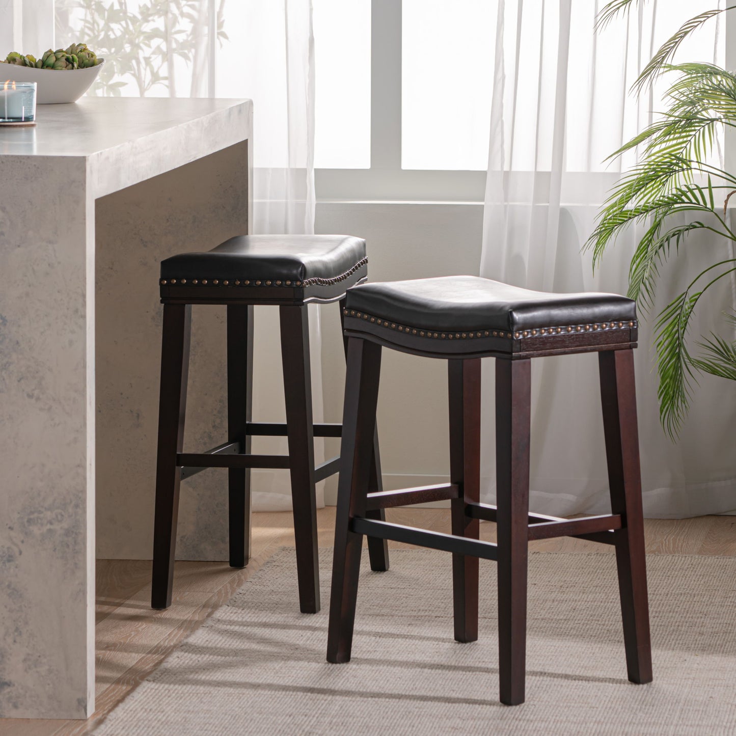 Elegant Saddle Stool With Curved Seat Comfort - Brown Noble House
