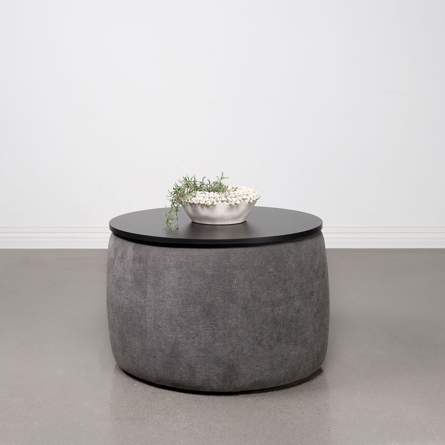 Reeves - Round Upholstered Lift Top Storage Ottoman - Gray Furniture Max